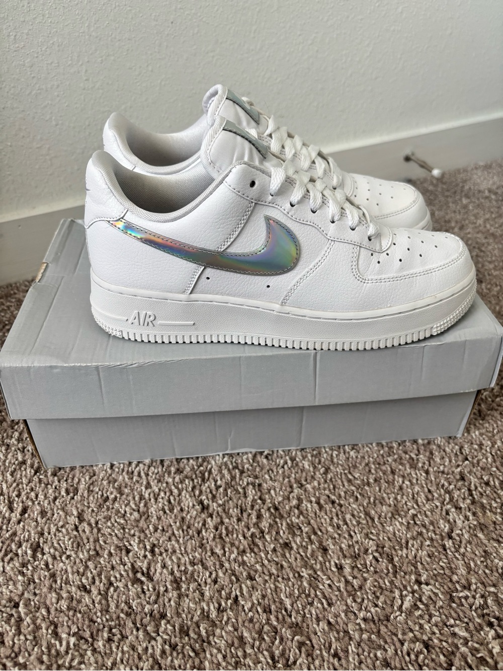Nike White Low-Top Sneakers with Iridescent Swoosh